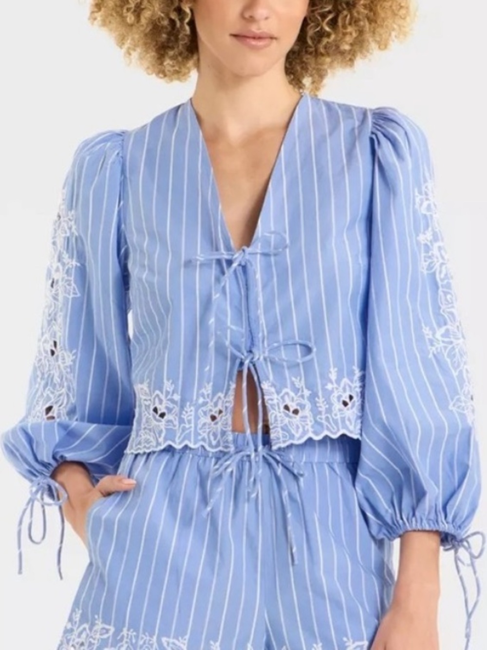FUTURE COLLECTIVE target blue striped eyelet long sleeve crop tie front top